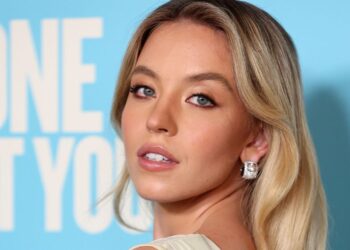 Sydney Sweeney’s Iconic Logomania Mini Dress Look