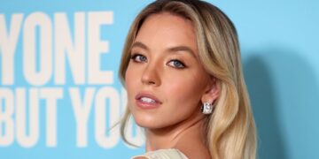 Sydney Sweeney’s Iconic Logomania Mini Dress Look